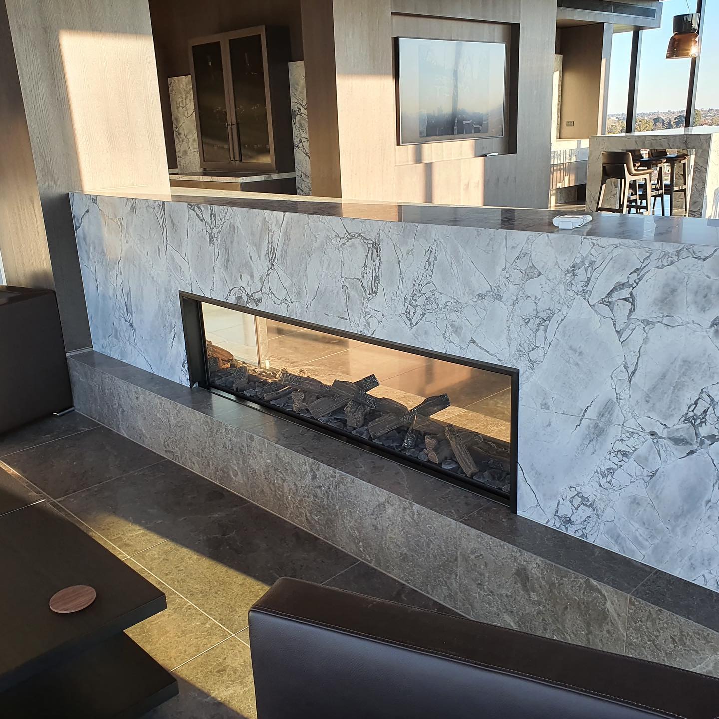 Escea Fire - Gas Fireplace Brands Modern stone finish Escea gas fireplace.